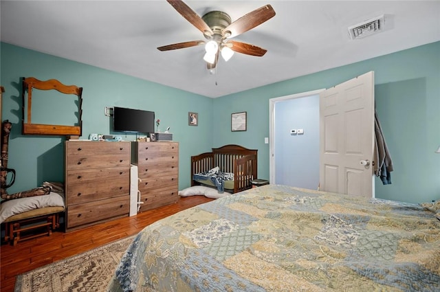 22417 N 1320th St, Marshall, IL 62441 - bedroom featuring wood finished floors and a ceiling fan