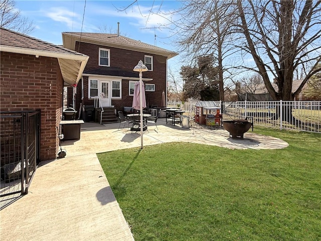 view of yard featuring entry steps, a patio area, and fence