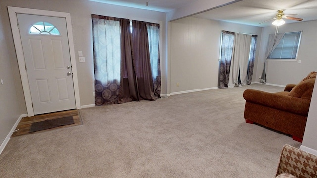1720 27th St, Decatur, IL 62526 - entryway with carpet, a ceiling fan, and baseboards