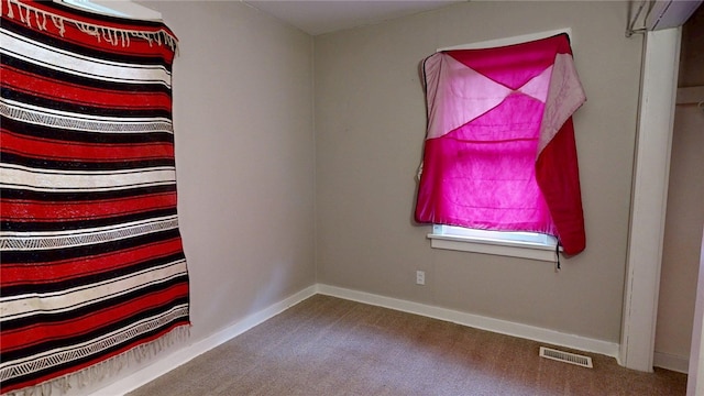 1720 27th St, Decatur, IL 62526 - spare room featuring carpet floors and baseboards
