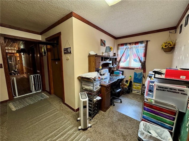 carpeted home office with a textured ceiling and ornamental molding