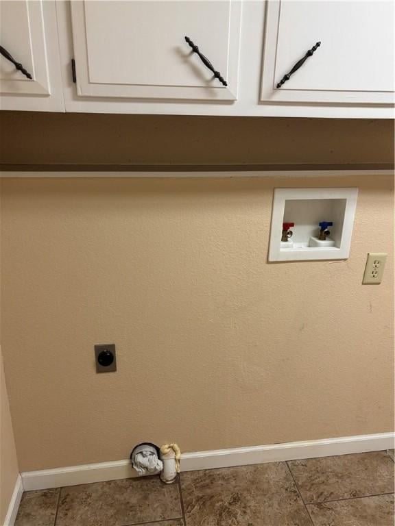 905 W Evergreen Ave, Effingham, IL 62401 - laundry room with hookup for an electric dryer, washer hookup, cabinet space, and tile patterned flooring