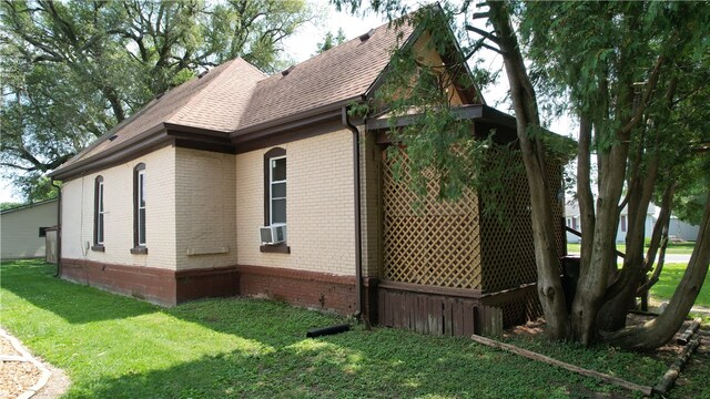 view of property exterior featuring a yard