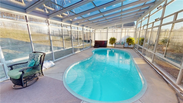 view of pool featuring a lanai and a patio