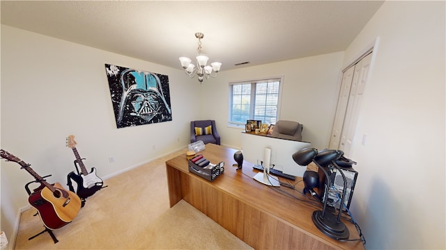 carpeted office space featuring an inviting chandelier