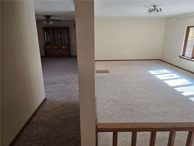 20746 E 400 N, Charleston, IL 61920 - carpeted empty room with ceiling fan and baseboards