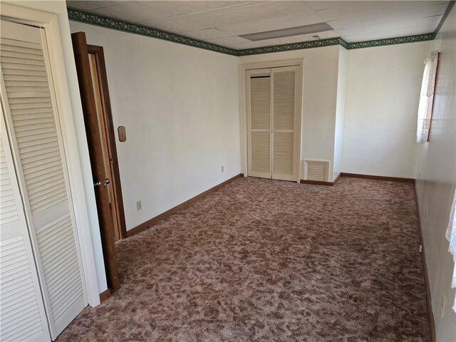 20746 E 400 N, Charleston, IL 61920 - unfurnished bedroom featuring carpet floors and baseboards