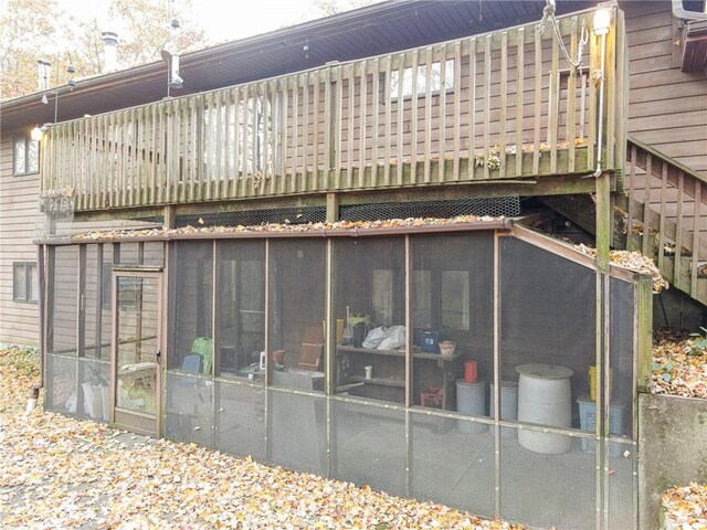 20746 E 400 N, Charleston, IL 61920 - rear view of house featuring a sunroom