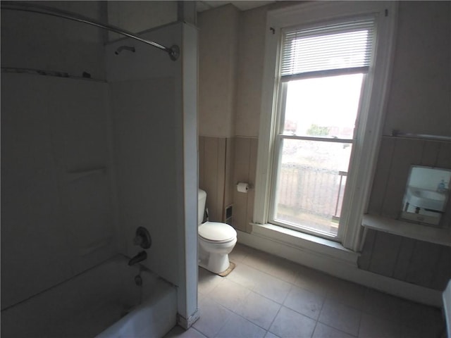 172 Broadway St, Shelbyville, IL 62565 - full bathroom featuring toilet, tub / shower combination, tile patterned flooring, and a healthy amount of sunlight