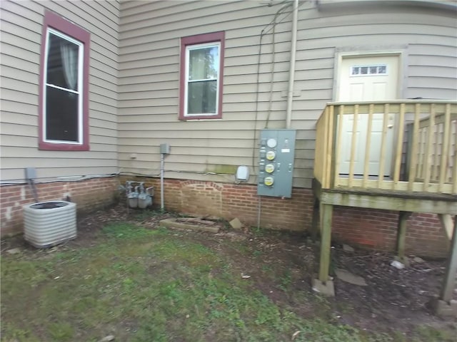 172 Broadway St, Shelbyville, IL 62565 - view of side of property with central air condition unit and a deck