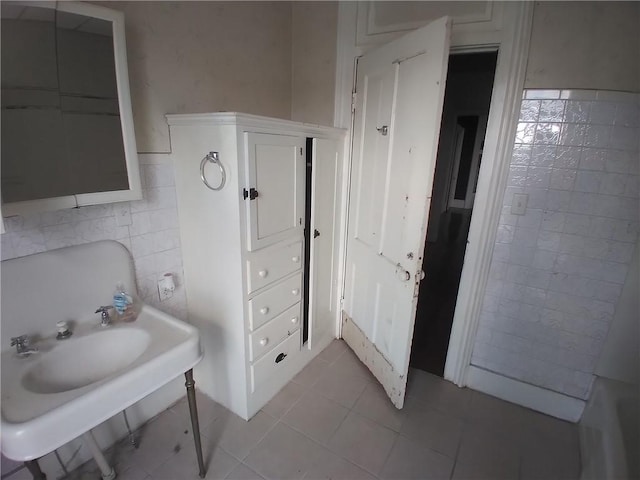 172 Broadway St, Shelbyville, IL 62565 - bathroom with tile patterned floors and tile walls