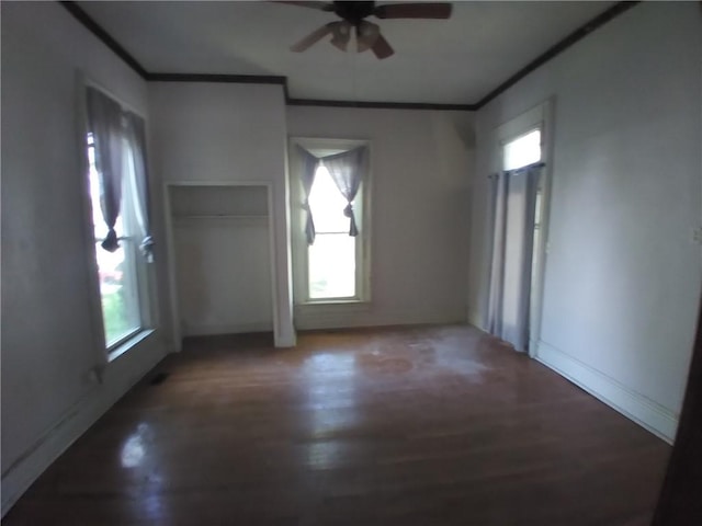 172 Broadway St, Shelbyville, IL 62565 - empty room featuring ornamental molding, a ceiling fan, and wood finished floors