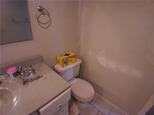 172 Broadway St, Shelbyville, IL 62565 - bathroom with tile patterned flooring, toilet, and vanity