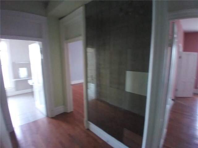 172 Broadway St, Shelbyville, IL 62565 - hallway featuring baseboards and wood finished floors