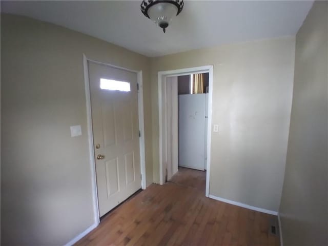 172 Broadway St, Shelbyville, IL 62565 - entrance foyer with baseboards and wood finished floors