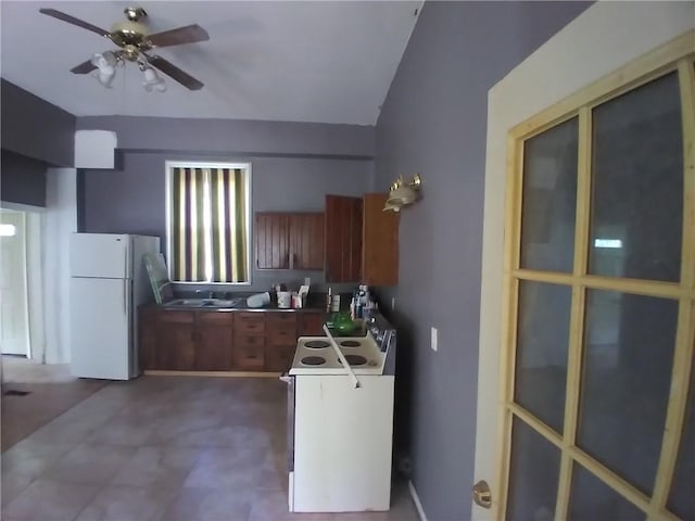 172 Broadway St, Shelbyville, IL 62565 - kitchen with a ceiling fan, white appliances, a sink, and dark floors