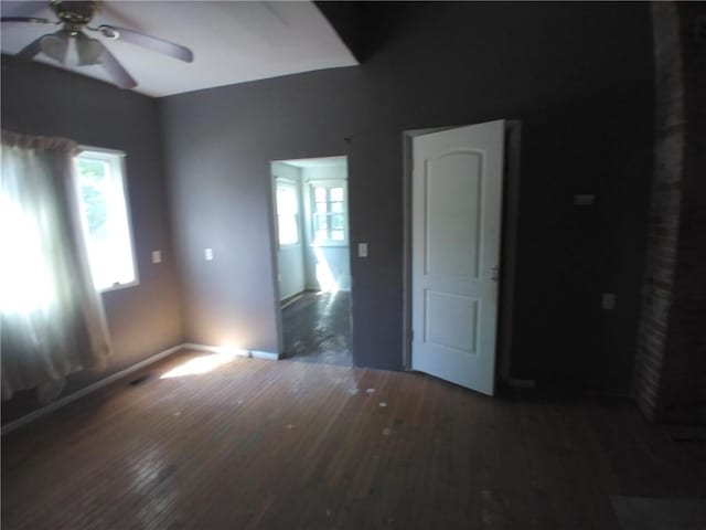172 Broadway St, Shelbyville, IL 62565 - unfurnished room with a wealth of natural light, a ceiling fan, and wood finished floors
