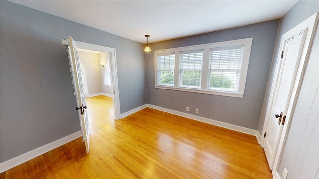 104 E N St, Ridgefarm, IL 61870 - empty room with light wood-style floors and baseboards