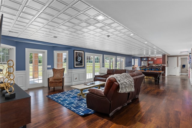 living room with dark wood-type flooring and pool table