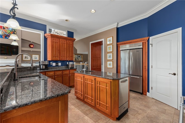 kitchen featuring a center island, sink, stainless steel fridge, decorative light fixtures, and ornamental molding