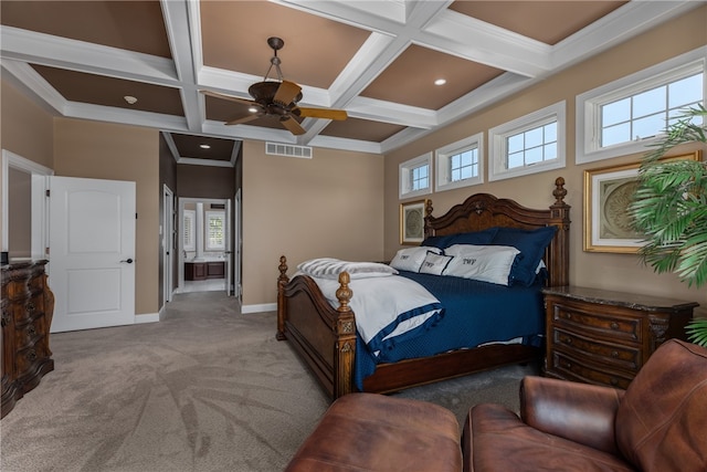 carpeted bedroom with beam ceiling, ceiling fan, coffered ceiling, and ornamental molding