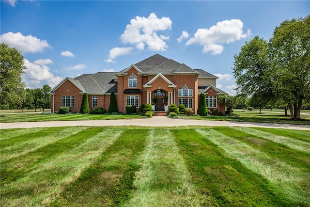 view of front of house with a front lawn