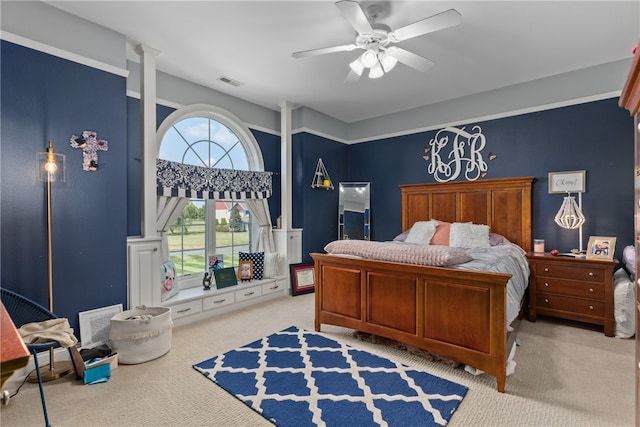 carpeted bedroom with ceiling fan