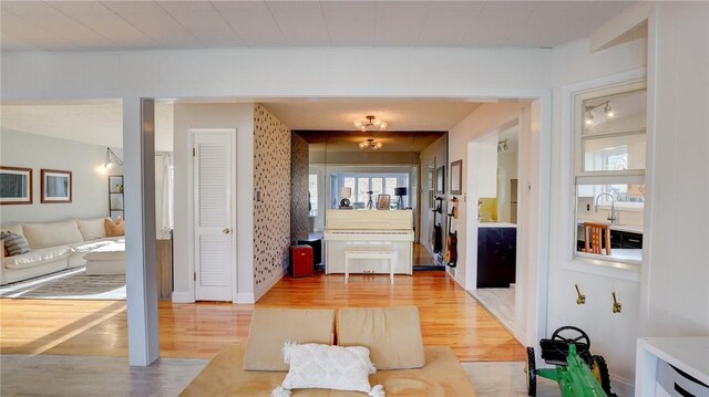 dining room with an inviting chandelier and light hardwood / wood-style flooring