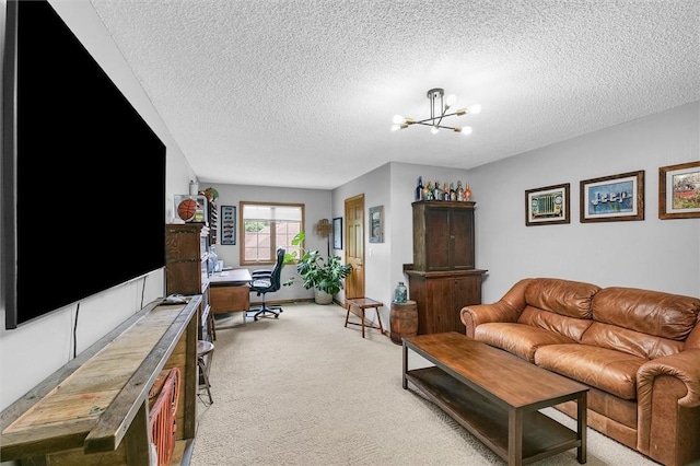 514 W Coolidge Ave, Charleston, IL 61920 - living room with light carpet, a textured ceiling, a chandelier, and an office area