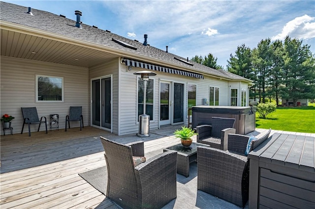 wooden deck with a hot tub