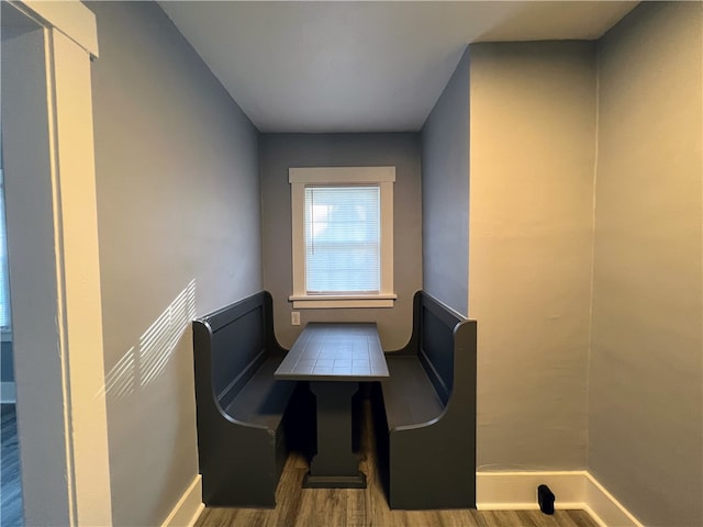 dining room with hardwood / wood-style flooring