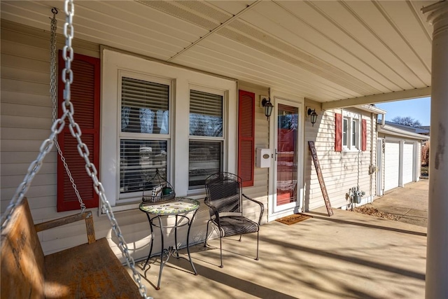 view of patio / terrace featuring a garage