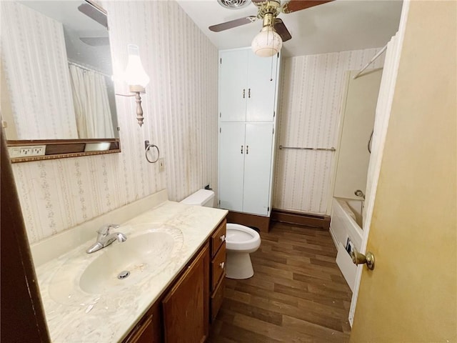 2810 Townway Rd, Danville, IL 61832 - full bath with ceiling fan, wallpapered walls, vanity, and wood finished floors