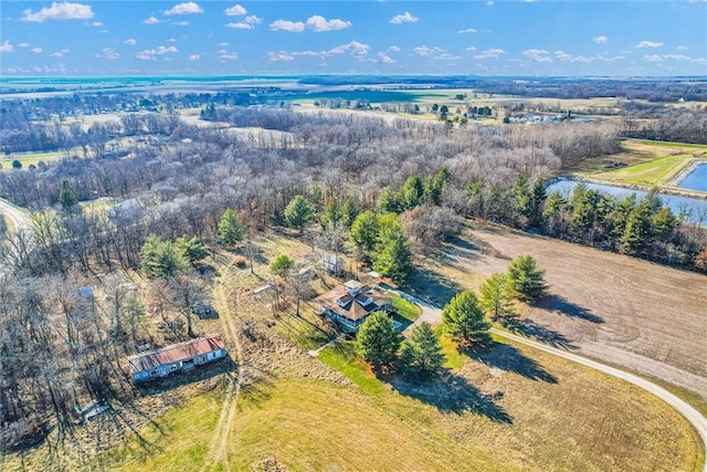 drone / aerial view featuring a rural view and a water view