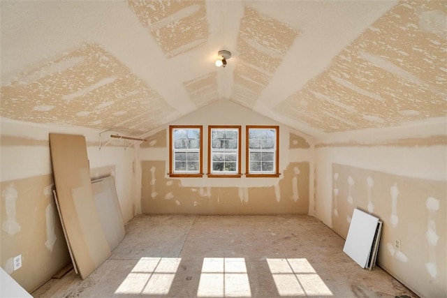 additional living space with vaulted ceiling