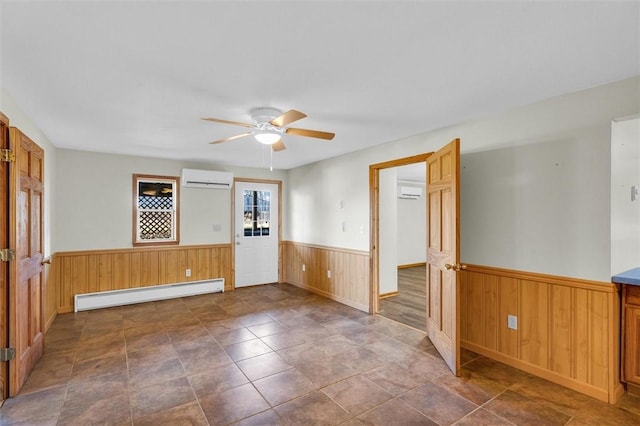 empty room with ceiling fan, baseboard heating, and a wall mounted AC