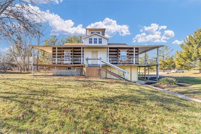 back of house with a yard and a wooden deck