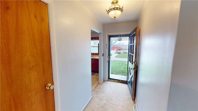 entryway with light carpet