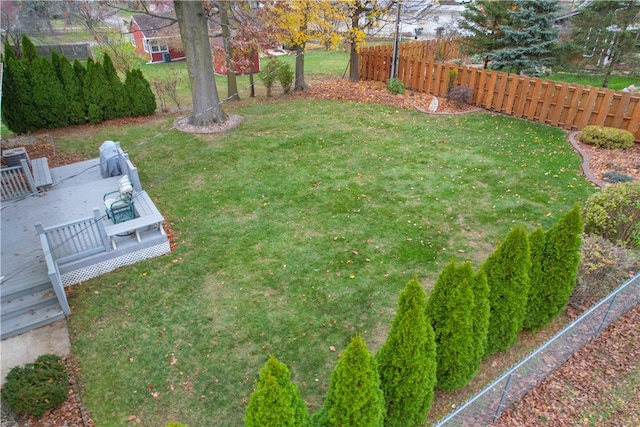 view of yard with a wooden deck