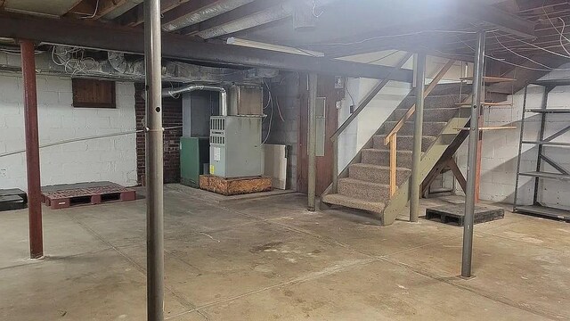 203 N E St, Olney, IL 62450 - unfinished basement with stairs and heating unit