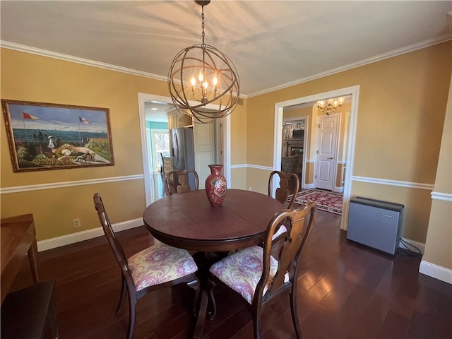 dining area with baseboards, dark wood-style flooring, and a notable chandelier