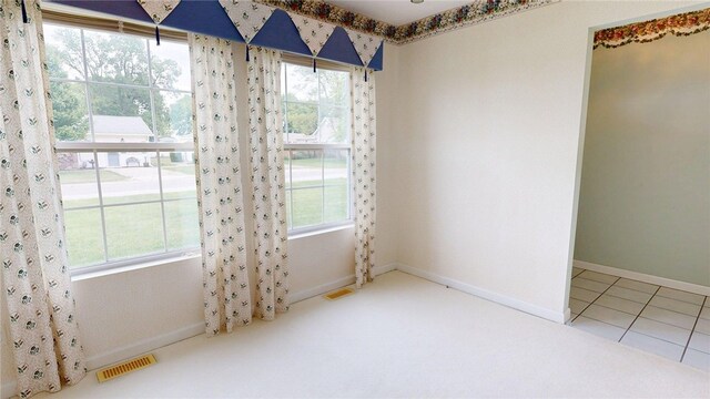 313 Shimp St, Cerro Gordo Township, IL 61855 - carpeted empty room with plenty of natural light and baseboards