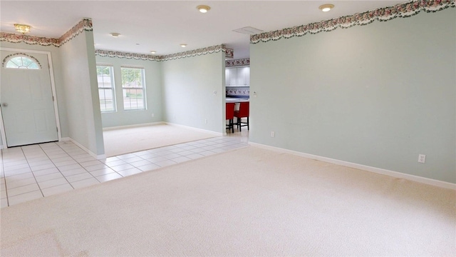 313 Shimp St, Cerro Gordo Township, IL 61855 - carpeted entrance foyer featuring baseboards and tile patterned floors