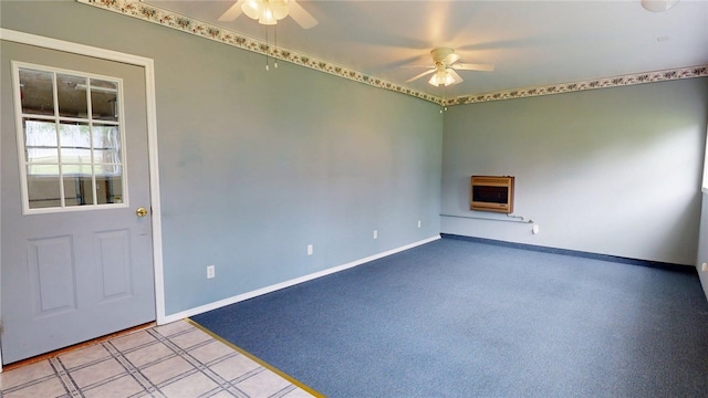 313 Shimp St, Cerro Gordo Township, IL 61855 - unfurnished room featuring ceiling fan, heating unit, and baseboards