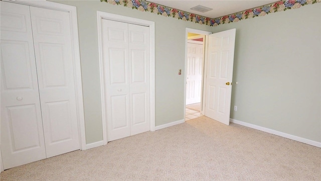 313 Shimp St, Cerro Gordo Township, IL 61855 - unfurnished bedroom featuring light colored carpet and baseboards