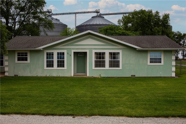 313 Shimp St, Cerro Gordo Township, IL 61855 - single story home with a front yard, a shingled roof, and stucco siding