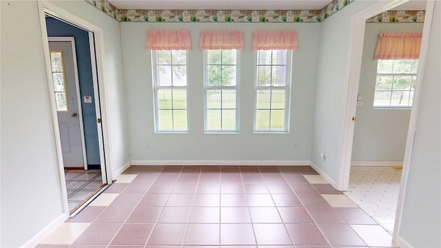 313 Shimp St, Cerro Gordo Township, IL 61855 - empty room featuring healthy amount of natural light and baseboards
