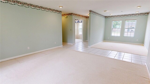 313 Shimp St, Cerro Gordo Township, IL 61855 - carpeted spare room with tile patterned floors and baseboards