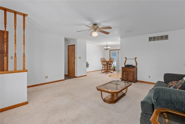 11444 N 800th St, Effingham, IL 62401 - carpeted living area featuring ceiling fan and a chandelier