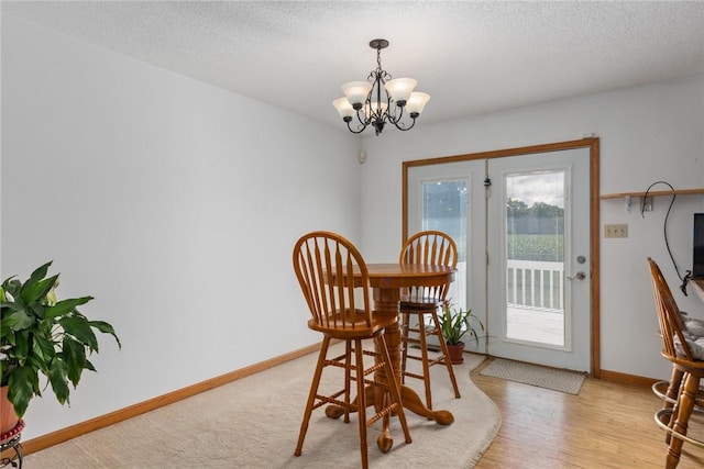 11444 N 800th St, Effingham, IL 62401 - dining area featuring a chandelier and a textured ceiling
